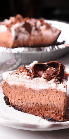 a piece of chocolate pie sitting on top of a white plate