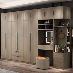 a room with wooden floors and cabinets in the corner, including a chair and footstool