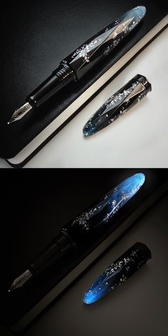 three different types of pens sitting on top of each other, one black and the other blue