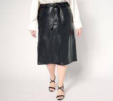 Explore an elegant new side to your style in this belted faux-leather midi, a striking, beautifully constructed selection for the office, celebrations, or date nights. From BEAUTIFUL by Lawrence Zarian. Belt Skirt, Date Nights, Faux Leather Skirt, The Office, Your Style, Date Night, Leather Skirt, Dress Skirt, Fashion Dresses