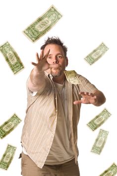 a man is throwing money in the air with his hands and fingers stock images, royalty photos