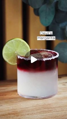 a margarita with a lime slice on the rim