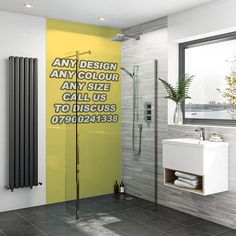 a bathroom with yellow walls and grey tile flooring