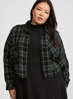 FIT Measures 22” from shoulder (size 2). Cropped silhouette. MATERIALS + CARE Acrylic woven fabric. . 100% cotton. Machine wash cold. Tumble dry low. Imported. DETAILS Collared neckline. Long sleeves. The best plus size women's lizzie cotton flannel cropped shirt long sleeve tops in study plaid deep black made of cotton. Torrid is your destination for the freshest spring and summer styles. Black Relaxed Fit Flannel Top, Oversized Black Flannel Top, Collared Cotton Tops For Fall, Collared Flannel Tops For Fall, Cotton Tops With Shirttail Hem For Fall, Plaid Long Sleeve Tops With Relaxed Fit, Plaid Long Sleeve Relaxed Fit Tops, Long Sleeve Flannel Tops For Spring, Spring Long Sleeve Flannel Tops