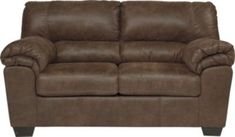 a brown leather loveseat on a white background