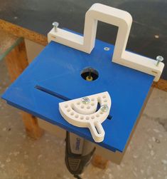 a blue table with a white object on it