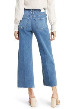 "Find PAIGE Anessa High Waist Wide Leg Jeans on Editorialist. The faded wash and roughed-up edges of these wide-leg jeans offer an authentic rigid look, but the denim is surprisingly soft and stretchy with great recovery. 26\" inseam; 22\" leg opening; 11 1/4\" front rise; 15 1/2\" back rise (size 29) 93% cotton, 5% polyester, 2% spandex Machine wash, line dry Imported" Fall Cutoff Denim Cropped Jeans, Cutoff Denim Jeans For Fall, Fall Cutoff Denim Jeans, Distressed High Waist Light Wash Flare Jeans, Dark Wash High Rise Jeans With Frayed Hem, Fall Cutoff Denim Flare Jeans, Fall Cutoff Flare Jeans, Fall Light Wash Cutoff Jeans, High Rise Dark Wash Cropped Jeans With Frayed Hem