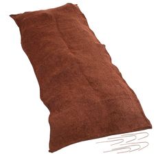 a brown pillow sitting on top of a white floor