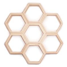 the wooden hexagons are arranged on top of each other