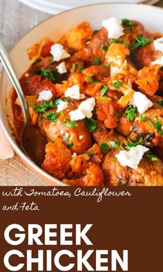 greek chicken stew with tomatoes, cauliflower and feta in a white bowl