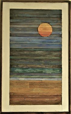 an abstract painting with wooden planks and a sun in the middle, on a wall