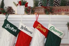 three christmas stockings hanging from a mantel