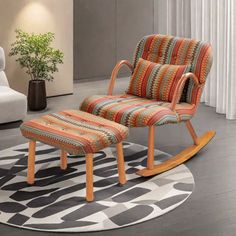 a chair and ottoman in a living room