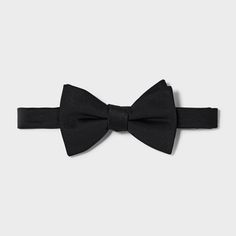 Update your formal accessories collection with this Bow Tie from Goodfellow & Co™. This stylish bow tie made from lightweight material with partial lining offers comfortable wear. It features a pre-tied style with an easy-close fastener for simple on and off. Pair it with your favorite dress shirt and suit jacket to complete your formal look. Goodfellow & Co™: Where style & fit are always in good company Elegant Summer Party Bow Tie, Classic Bow Tie For Black Tie Events, Black Bow Tie For Summer Party, Tailored Black Suit And Tie Accessories For Party, Summer Party Suit And Tie Accessories With Satin Bow, Fitted Bow For Black Tie Events In Spring, Fitted Bow For Black Tie Event In Spring, Formal Ties With Detachable Bow, Summer Formal Bow Tie With Detachable Bow