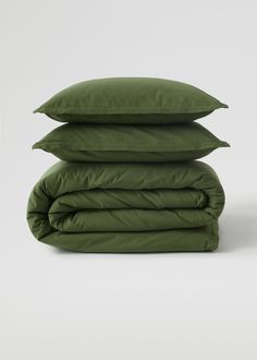 three pillows stacked on top of each other