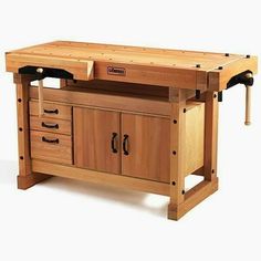 a workbench with two drawers and one drawer on the top is made out of wood