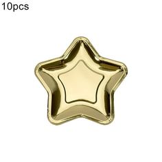 a gold star shaped cake pan on a white background