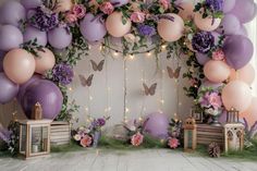 a room with balloons and flowers on the wall