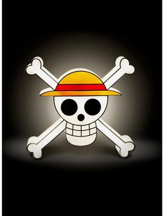 a skull and crossbones with a hat on it's head is lit up in the dark