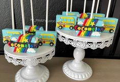 there are cake pops in the shape of cars and trucks on top of each other