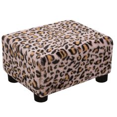 a leopard print footstool with black legs and an animal print pattern on it