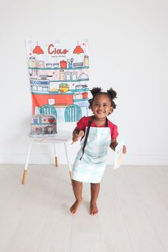 Ciao! Unleash your child's inner chef with this imaginative play kit!Housed in a compact suitcase, this kit includes an oversized fabric poster, apron, 3 receipts, felt pasta in a resealable pouch, wooden spoon, metal pot and a 50 page 4x6" order notepad.Inside the suitcase, discover a captivating kitchen scene that your little chef can use to cook and serve pasta, providing hours of pretend play and creative fun. This kit allows children to take on the role of chef, customer or server all in on Felt Pasta, Pasta Shop, Kitchen Scene, Fabric Poster, Pretend Play Toys, Baby Soft Toys, Pretty Box, Wooden Spoon, Play Toys