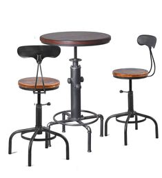 three stools and a table with a wooden top