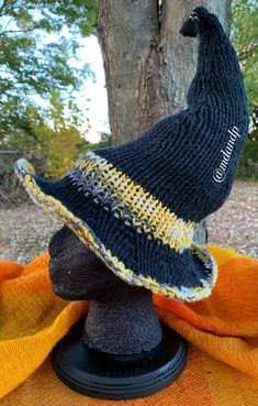 Bumble's Witch Hat was designed for the witch on the go--a trim brim for light shaping jobs and a tassel dangle accessory give this hat a punctuated, perfunctory and perfectly prim look. The stuffing in the cone of the hat make it possible for you to give the hat any mood you desire, from curved up to down to crooked or straight. Bee-inspired colors make Bumble's Witch Hat cute as they come. Pop it on and bee busy! Red Witch Hat, Red Witch, Witches Hat, Bee Inspired, Halloween Hats, Halloween Crochet, Save The Bees, Costume Hats, The Witch