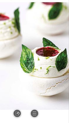 small cakes decorated with leaves and sauces