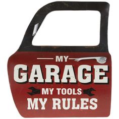 Give your garage or workshop a boost of color and dimensional decor with My Garage, Tools & Rules Truck Door Metal Wall Decor! This fun wall accent features a small replica of a truck door with a fake side mirror and door handle.   The metal piece is printed in red, black, and cream-white with faux scratches and rust for a worn appearance. Hang it on the wall with other colorful tin signs for an amusing space you love to work, repair, restore, and tinker in.     Details:   Length: 18 1/4"  W