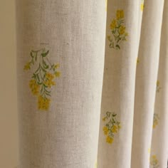 curtains with yellow and green flowers on them