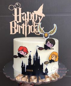 a birthday cake with harry potter characters on it