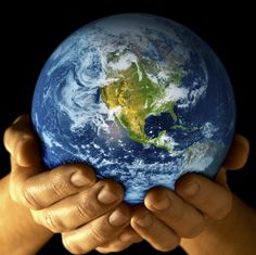 two hands holding up the earth with text that reads make a difference in the world