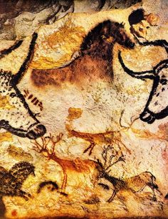 an artistic rock painting with horses and deer