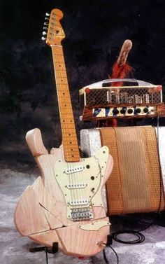 an electric guitar and amp sitting next to each other