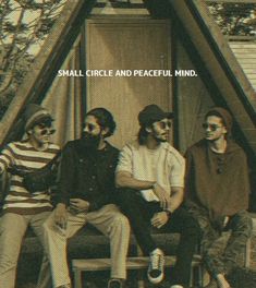 three men sitting on a bench in front of a building with the words small circle and peaceful mind