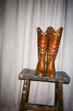 These Eve Doodle Cowboy Boots are each handmade and hand painted with love by artisans in México. Each pair features Eve in the Garden of Eden. As they are made in México, the fit is slightly wider and they run half a size large, so we recommend that half sizes size down.  Our Doodle Boots are handmade and hand painted boots made by Artisans in México using traditional techniques, these cowboy boots are a literal dream come true for us.    This is a very small batch production.  4 inch heel. SIZING DETAILS: As they boots are made in Mexico, they do have a wider fit. The boots run half a size large, so please size down if you are a half size. Hand Painted Boots, Painted Boots, Nigerian Culture, Brother Vellies, Bow Flip Flops, Fashion Makeover, The Garden Of Eden, Clothing Factory, Stunning Shoes