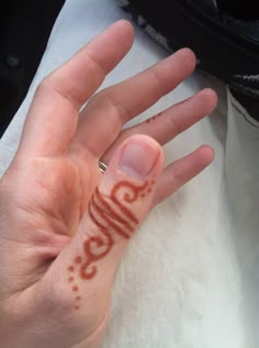 a person's hand with the word love written on it