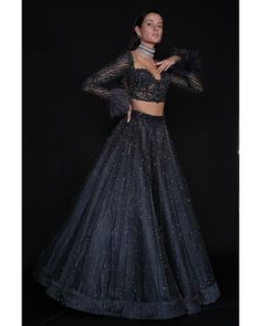 Charcoal Blue Lehenga Set - Bora Honey's Immerse yourself in the allure of our Charcoal Blue Lehenga, a mesmerizing ensemble adorned with an exquisite interplay of stones, crystals, and sequins. The meticulous craftsmanship showcases the intricate detailing of Japanese cut-dana, adding a touch of sophistication and elegance. The ethereal design is further accentuated by delicately incorporated feathers, creating a harmonious blend of tradition and contemporary style in this captivating charcoal Wedding Bride Dress, Grey Lehenga, Ethereal Design, Hand Embroidery Work, Wedding Fits, Charcoal Blue, Blue Lehenga, Online Shipping, Fashion Drawing Dresses