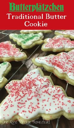 some cookies are decorated with icing and sprinkles on a cooling rack