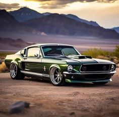 a green mustang parked in the desert with mountains in the background