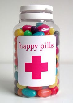 a jar filled with lots of colorful candies