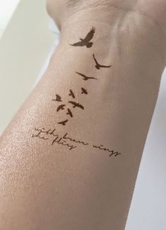 a woman's arm with birds on it and the words to heaven written in cursive ink