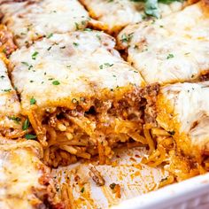 a casserole dish filled with meat and cheese