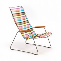 a multicolored lawn chair sitting on top of a metal frame