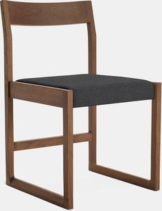 a wooden chair with black fabric seat pad