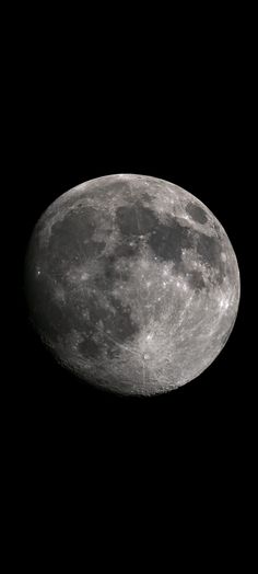 the full moon is shown in black and white