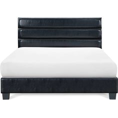 a black and white bed with an upholstered headboard on it's side