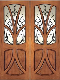 two wooden doors with decorative glass panels