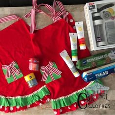 the contents of a christmas apron are laid out on the floor